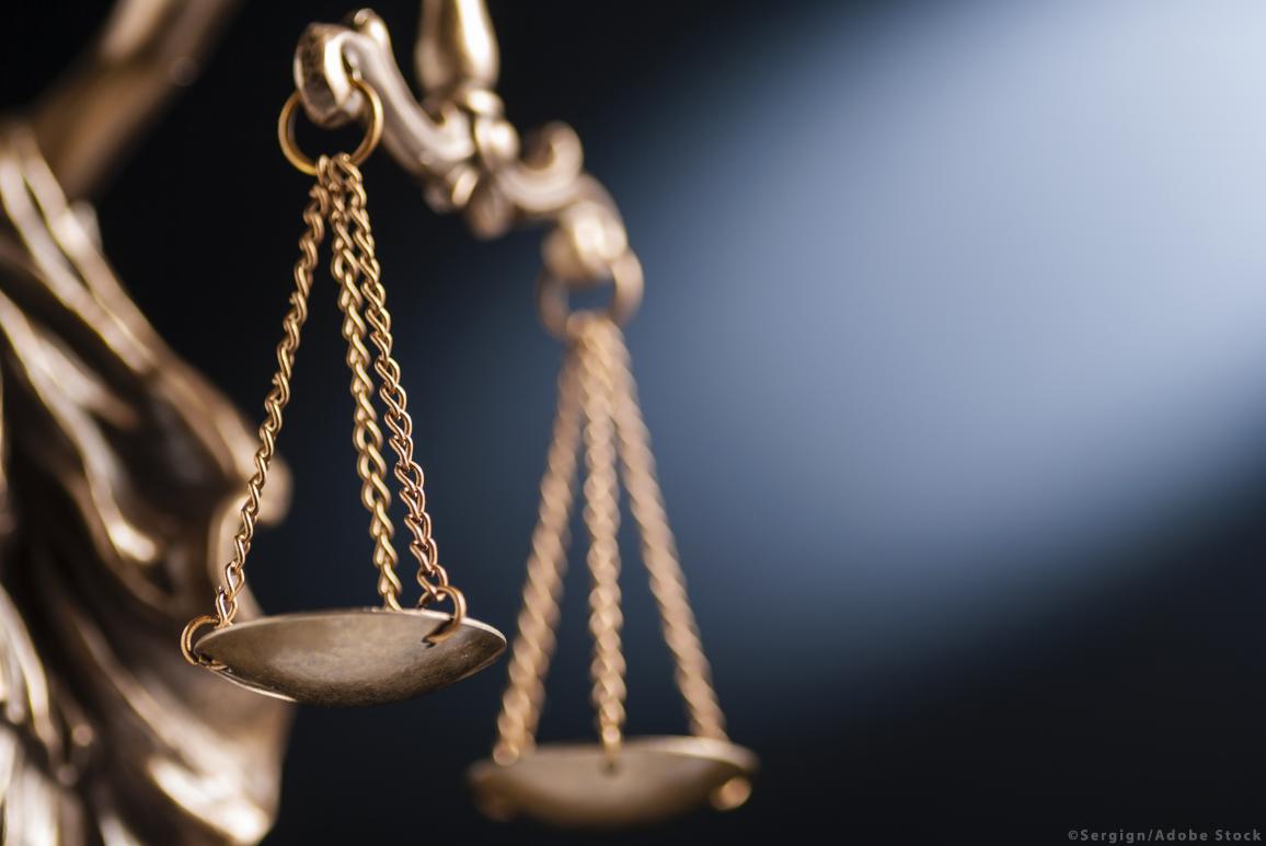 Close up on the scales of justice ©AdobeStock_Sergign